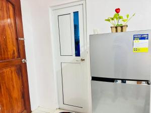 Kuchyň nebo kuchyňský kout v ubytování 2BR Apartment in Candon City