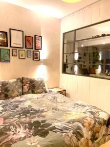 a bedroom with a bed and a window in it at B&B Loft 57 in Amsterdam +37 photos