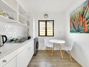 Køkken eller tekøkken på Tranquil Garden Cottage