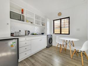 Køkken eller tekøkken på Tranquil Garden Cottage + 3 billeder