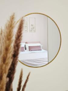 Postel nebo postele na pokoji v ubytování NORA Apartment 2 + 9 fotografií