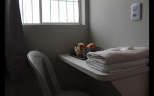 Ένα ή περισσότερα κρεβάτια σε δωμάτιο στο Hotel Charm