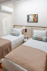 Cama o camas de una habitación en Cheya Deluxe Residence Nisantasi Istanbul City Center