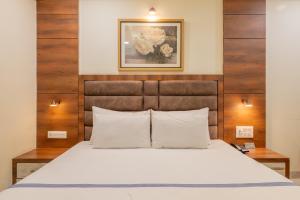 Giường trong phòng chung tại Hotel Highway King Jaipur