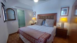 Ένα ή περισσότερα κρεβάτια σε δωμάτιο στο Apartment in the centre of Mijas Pueblo with stunning views +28 φωτογραφίες