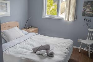 Postel nebo postele na pokoji v ubytování Condo at Massif du Sud - Condo Thibault 117 + 15 fotografií