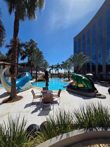 Bazén v ubytování Apartamento CondoHotel Barretos Park do Peão 1232 nebo v jeho okolí