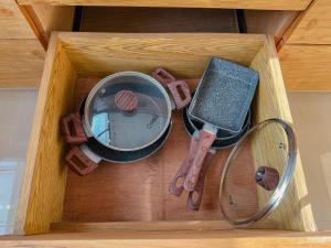 a wooden box with a mirror and other items at Tranquil 2BR Villa with Pool in Kerobokan
