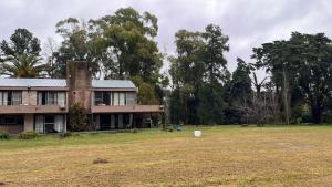 Κήπος έξω από το Alamos de Carlos Keen