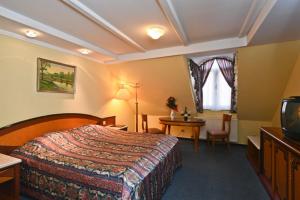 Posteľ alebo postele v izbe v ubytovaní Offi Haz Hotel + 11 fotografií