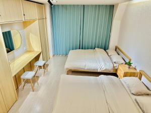 En eller flere senge i et værelse på Myeongdong Zero Distance