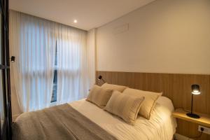 En eller flere senge i et værelse på Colon y la costa