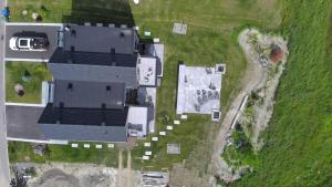 an aerial view of a house with a yard at Mountain View - World Cup in Beaupré