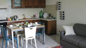 A kitchen or kitchenette at Holiday Home Cannubi in Barolo