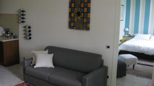 A seating area at Holiday Home Cannubi in Barolo