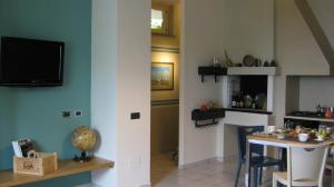 A kitchen or kitchenette at Holiday Home Cannubi in Barolo
