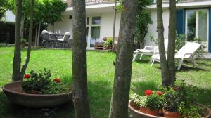 A garden outside Holiday Home Cannubi in Barolo
