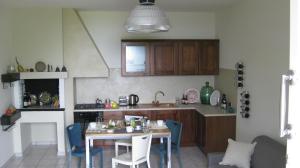 A kitchen or kitchenette at Holiday Home Cannubi in Barolo