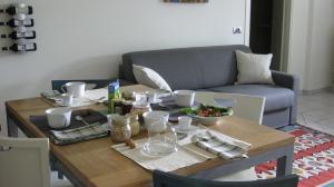 A seating area at Holiday Home Cannubi in Barolo