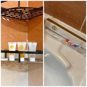 a refrigerator with several bottles of detergent on a shelf at قصر الضيافه in Medina +3 photos