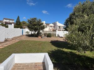 Κήπος έξω από το Blue Fish Cottage