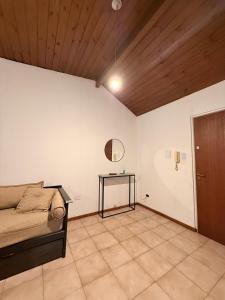a room with a bed and a table in it at Dto centro RG in Bahía Blanca