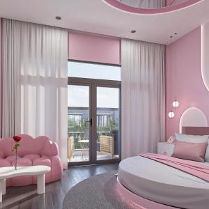 En eller flere senge i et værelse på Đào Hoa Love Hotel