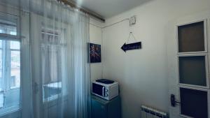 TV a/nebo společenská místnost v ubytování Квартира в Сисиане на главной площади Բնակարան Սիսիանում հրապարակի վրա Apartment in Sisian on the main square