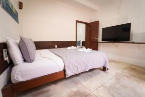 Μια τηλεόραση ή/και κέντρο ψυχαγωγίας στο Villa Gostô