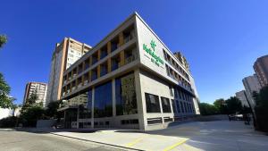 a building with a sign on the front of it at Holiday Inn Istanbul - Beylikduzu by IHG in Istanbul