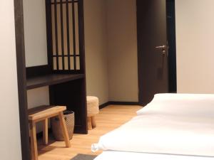 En eller flere senger på et rom på Hotel zur Amtspforte