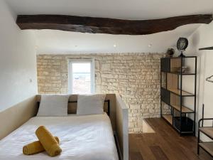 Postel nebo postele na pokoji v ubytování Chez Jean-Yves et Zoé - LE SAINT ANDRÉ - Au calme, Très propre, Proche parkings, Clim