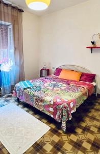 Ένα ή περισσότερα κρεβάτια σε δωμάτιο στο Sa Domo de Pedru