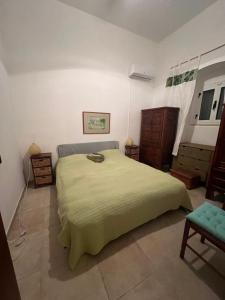 Ένα ή περισσότερα κρεβάτια σε δωμάτιο στο Villa Nathalie