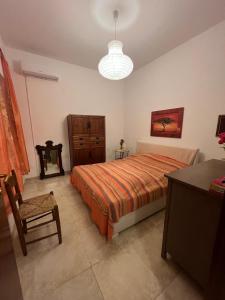 Ένα ή περισσότερα κρεβάτια σε δωμάτιο στο Villa Nathalie