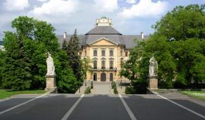 a large building with a road in front of it at Veva Apartman - Eger Magánszálláshely in Eger