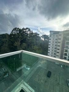 a view of a building with a glass roof at Adik Aisyah homestay cameron quintet A3-7-3A in Tanah Rata