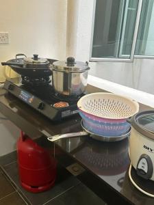 Kuchyň nebo kuchyňský kout v ubytování Adik Aisyah cameron homestay quintet A3-7-5