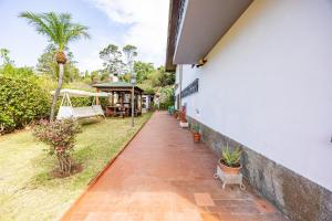 Κήπος έξω από το Vila Gama Apartaments