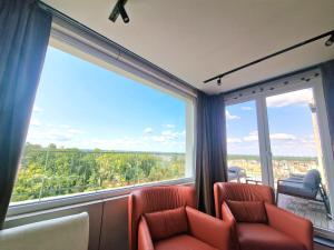 Un lugar para sentarse en Penthouse Apartment Belgrade