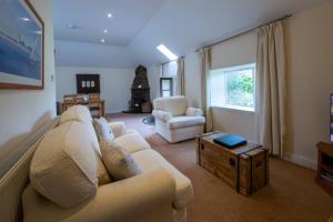 Χώρος καθιστικού στο Loch Tay Bothy Cottage with Hot Tub