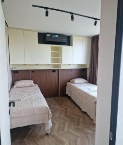 Una cama o camas en una habitación de Penthouse Apartment Belgrade