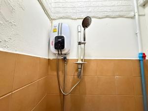 Ένα μπάνιο στο Happyland Guesthouse