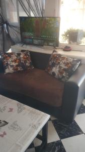 Μια τηλεόραση ή/και κέντρο ψυχαγωγίας στο Appartement dar bouaaza tamaris