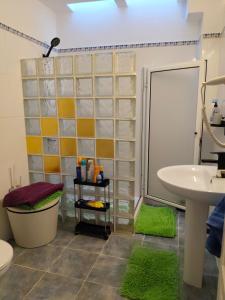 a bathroom with a toilet and a sink at Vistas al mar 2 in Tías