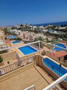 arial view of a balcony with two swimming pools at Casa Sacy in Villajoyosa