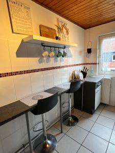 Kuchyň nebo kuchyňský kout v ubytování Wohnen wie zuhause für bis zu 5 Personen + 11 fotografií