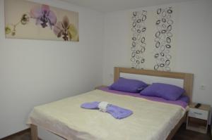 Postel nebo postele na pokoji v ubytování Apartment Igor