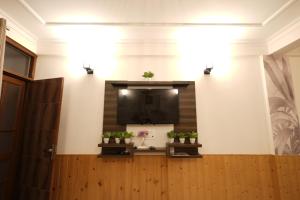 TV a/nebo společenská místnost v ubytování Wandernest Homes Boho Bliss