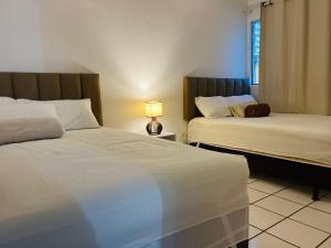 Postel nebo postele na pokoji v ubytování Flat Comfort Boa Viagem